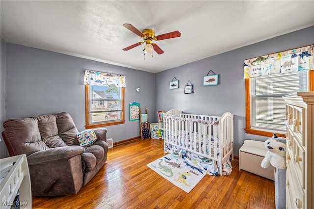 1743 Silver St, Wickliffe, OH 44092 - bedroom with wood finished floors and ceiling fan
