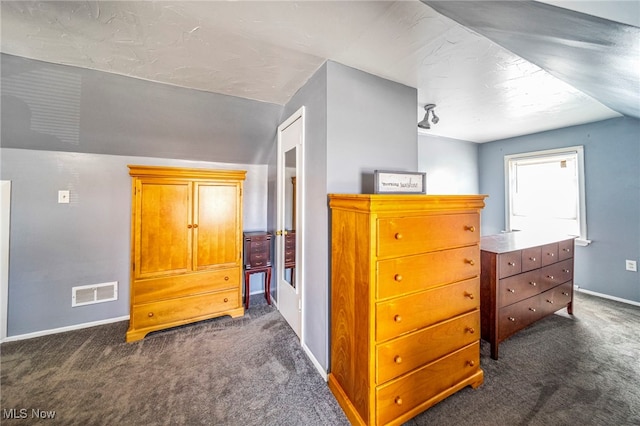 1743 Silver St, Wickliffe, OH 44092 - bedroom with dark carpet and lofted ceiling