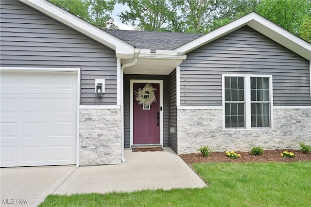 4933 Lear Nagle Rd, North Ridgeville, OH 44039 - property entrance with stone siding and a garage