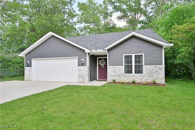 4933 Lear Nagle Rd, North Ridgeville, OH 44039 - single story home featuring a garage, driveway, a front yard, and a shingled roof