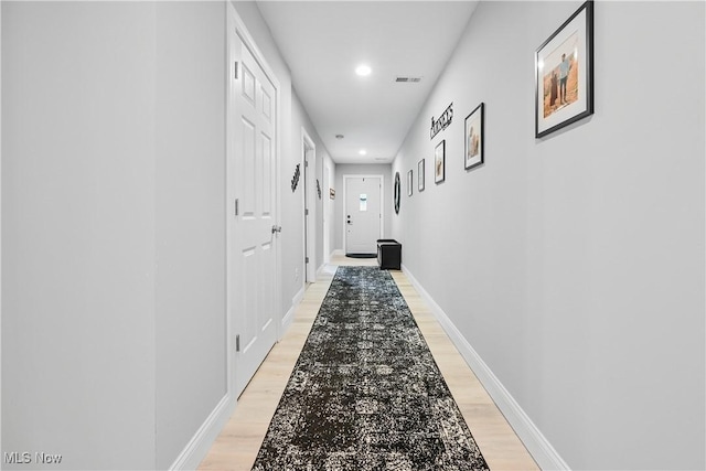 4933 Lear Nagle Rd, North Ridgeville, OH 44039 - hallway featuring light wood-type flooring and recessed lighting