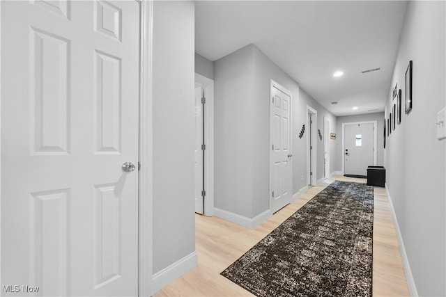 4933 Lear Nagle Rd, North Ridgeville, OH 44039 - corridor featuring light wood-type flooring and recessed lighting