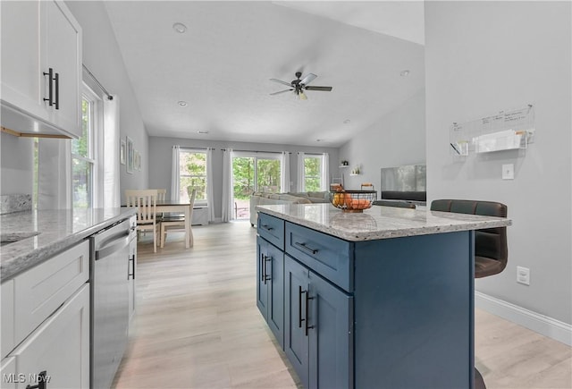 4933 Lear Nagle Rd, North Ridgeville, OH 44039 - kitchen featuring dishwasher, white cabinets, a ceiling fan, light wood-style floors, and a center island