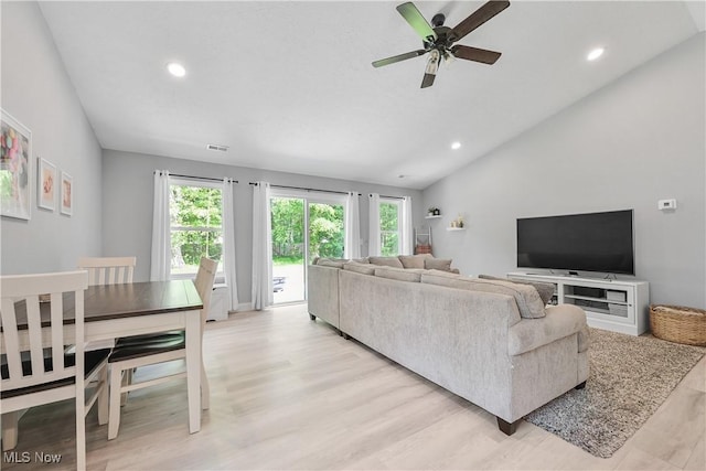 4933 Lear Nagle Rd, North Ridgeville, OH 44039 - living room with vaulted ceiling, plenty of natural light, light wood-style flooring, a ceiling fan, and recessed lighting