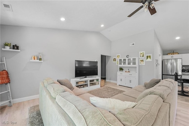 4933 Lear Nagle Rd, North Ridgeville, OH 44039 - living room featuring light wood finished floors, a ceiling fan, recessed lighting, and high vaulted ceiling