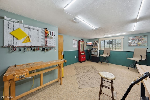 25171 Doe Dr, North Olmsted, OH 44070 - game room with a textured ceiling and wainscoting