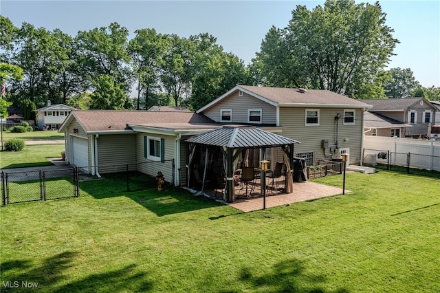 25171 Doe Dr, North Olmsted, OH 44070 - back of house with a gazebo, a fenced backyard, a gate, a garage, and a patio