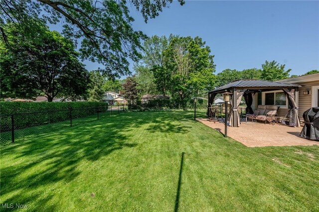 25171 Doe Dr, North Olmsted, OH 44070 - view of yard featuring a gazebo and a patio