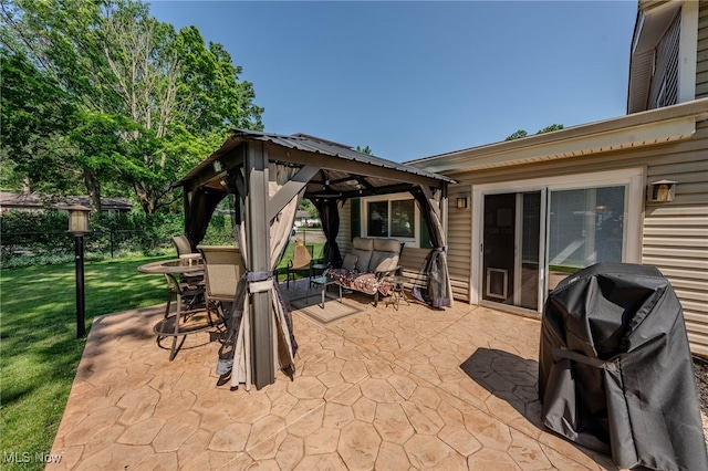 25171 Doe Dr, North Olmsted, OH 44070 - view of patio featuring grilling area, a gazebo, and an outdoor living space