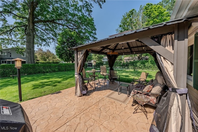 25171 Doe Dr, North Olmsted, OH 44070 - fenced backyard featuring a gazebo and a patio area