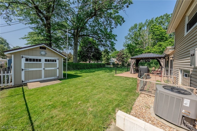 25171 Doe Dr, North Olmsted, OH 44070 - fenced backyard featuring a gazebo, a storage unit, and a patio area