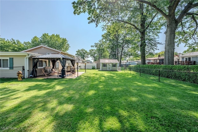 25171 Doe Dr, North Olmsted, OH 44070 - fenced backyard with a gazebo, a storage unit, and a patio