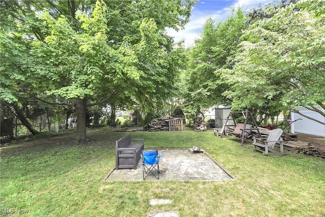 4480 W 224th St, Fairview Park, OH 44126 - view of green lawn featuring a patio
