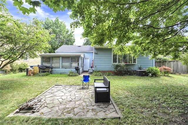 4480 W 224th St, Fairview Park, OH 44126 - rear view of property with a sunroom and a patio