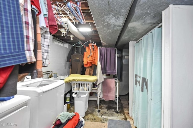 4480 W 224th St, Fairview Park, OH 44126 - laundry room featuring washing machine and dryer and concrete block wall