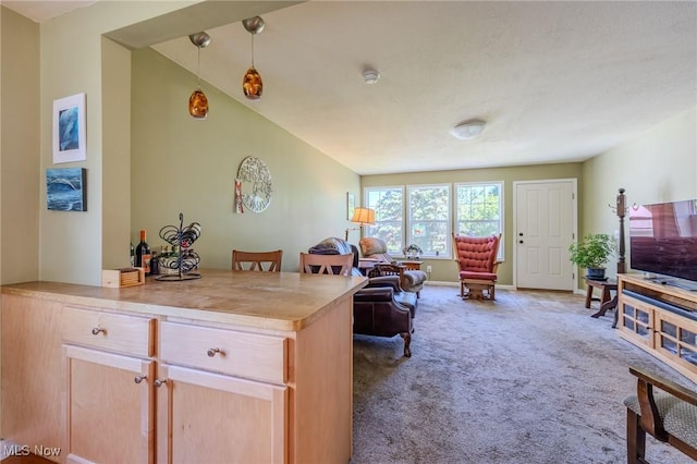 4959 Anderson Rd, Lyndhurst, OH 44124 - kitchen with carpet flooring, open floor plan, decorative light fixtures, and light countertops