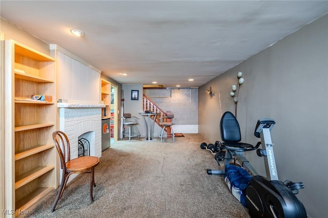 4959 Anderson Rd, Lyndhurst, OH 44124 - workout room with carpet flooring and a brick fireplace