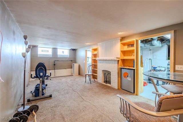 4959 Anderson Rd, Lyndhurst, OH 44124 - carpeted living room with a brick fireplace