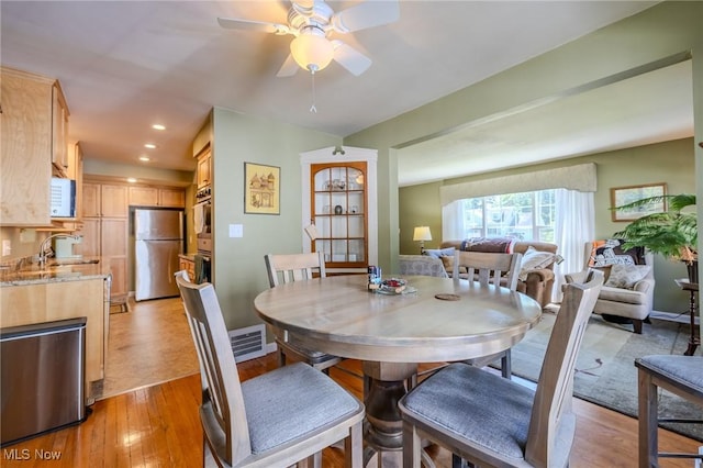4959 Anderson Rd, Lyndhurst, OH 44124 - dining room with light wood-style floors, ceiling fan, and recessed lighting