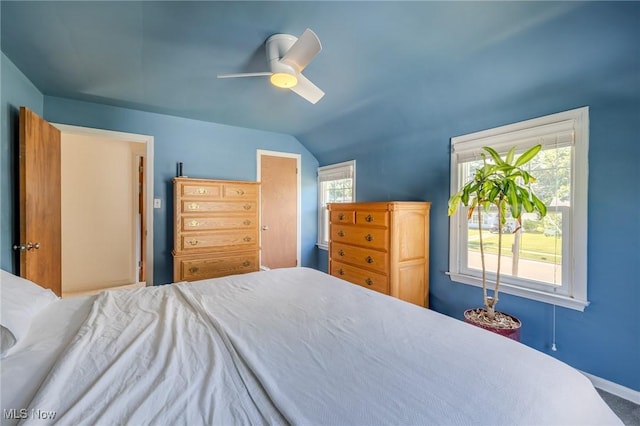 4959 Anderson Rd, Lyndhurst, OH 44124 - carpeted bedroom featuring lofted ceiling and a ceiling fan