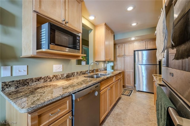 4959 Anderson Rd, Lyndhurst, OH 44124 - kitchen with stainless steel appliances, light stone countertops, recessed lighting, and light brown cabinetry