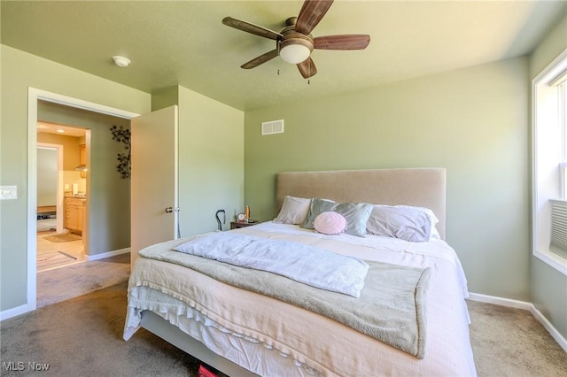 4959 Anderson Rd, Lyndhurst, OH 44124 - carpeted bedroom with baseboards and a ceiling fan