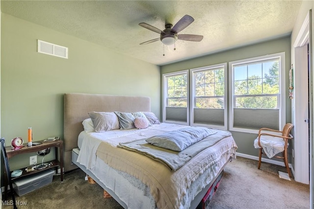 4959 Anderson Rd, Lyndhurst, OH 44124 - bedroom featuring carpet flooring, a textured ceiling, and a ceiling fan