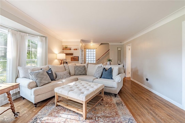 2383 Saybrook Rd, University Heights, OH 44118 - living area with plenty of natural light, light wood-style floors, crown molding, and stairway