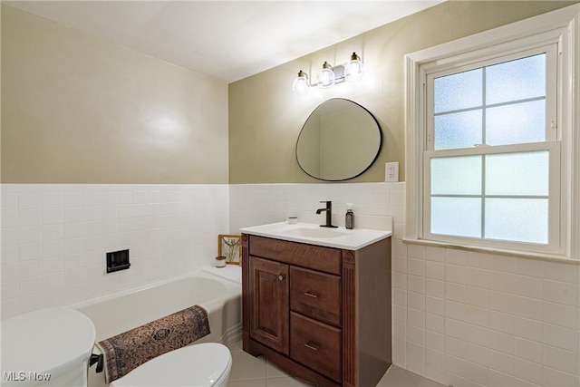 2383 Saybrook Rd, University Heights, OH 44118 - full bathroom featuring tile walls, vanity, a garden tub, wainscoting, and tile patterned floors