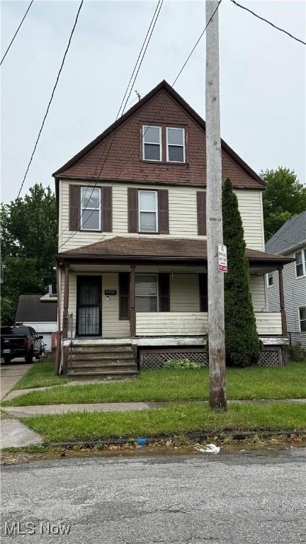 6330 Carl Ave, Cleveland, OH 44103 - view of front of house with a porch
