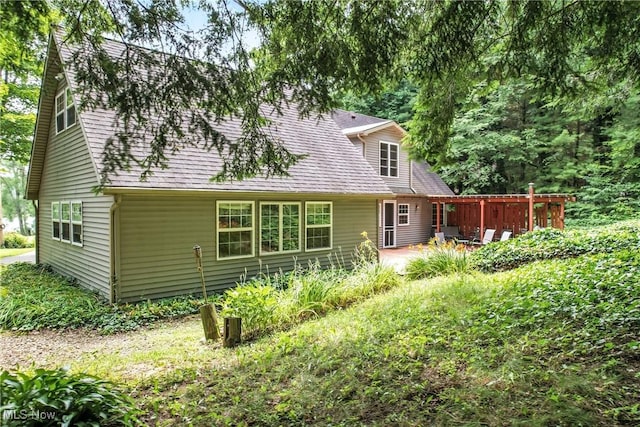 1173 Ridge Rd, Salem, OH 44460 - back of house featuring a patio area and roof with shingles