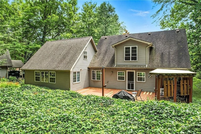 1173 Ridge Rd, Salem, OH 44460 - back of property featuring a wooden deck and roof with shingles