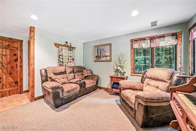 1173 Ridge Rd, Salem, OH 44460 - carpeted living area with recessed lighting and tile patterned floors