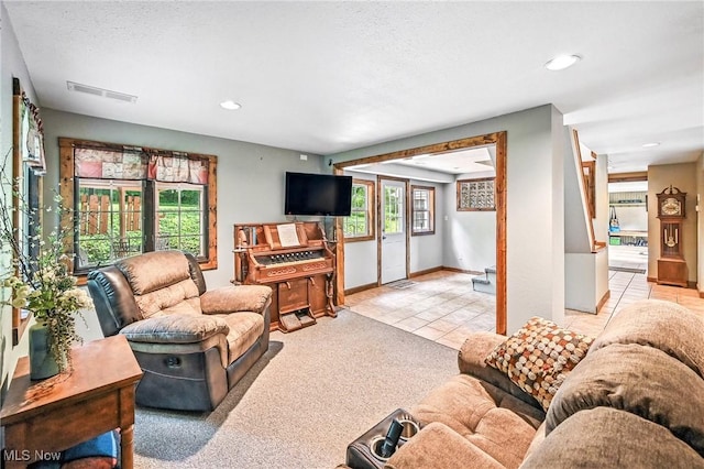 1173 Ridge Rd, Salem, OH 44460 - living room with light tile patterned floors and recessed lighting