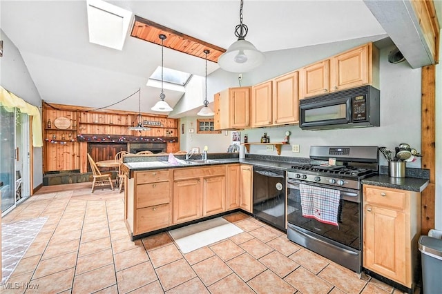 1173 Ridge Rd, Salem, OH 44460 - kitchen featuring black appliances, light brown cabinetry, dark countertops, a skylight, and a peninsula