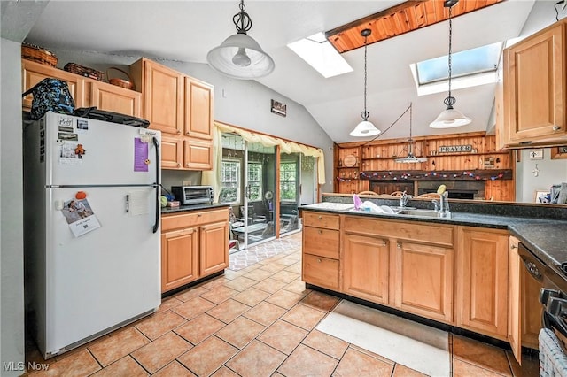 1173 Ridge Rd, Salem, OH 44460 - kitchen featuring freestanding refrigerator, a skylight, vaulted ceiling, light tile patterned floors, and decorative light fixtures