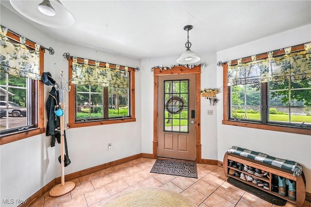 1173 Ridge Rd, Salem, OH 44460 - entryway with baseboards and light tile patterned flooring