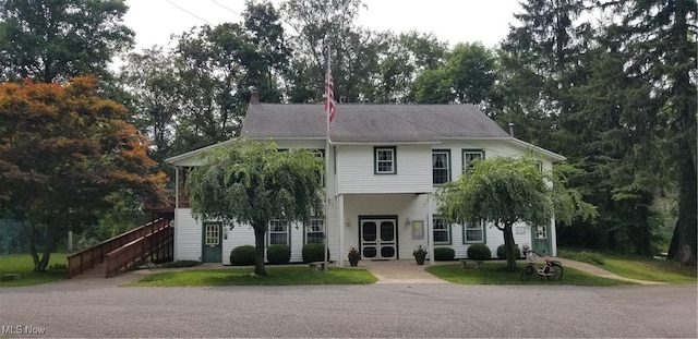 1173 Ridge Rd, Salem, OH 44460 - view of front of property featuring stairs and view of wooded area