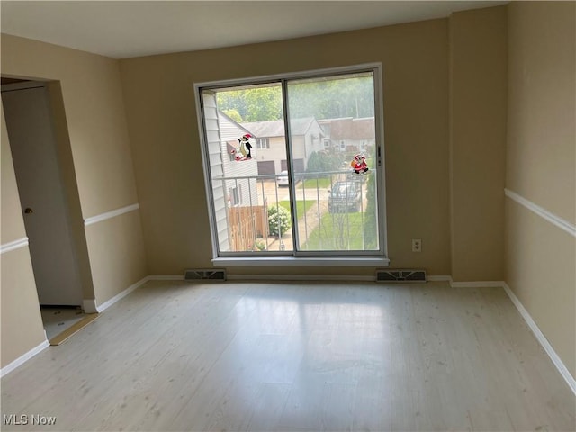 6466 Concord Rd Unit M4, Parma, OH 44134 - spare room with wood finished floors and baseboards