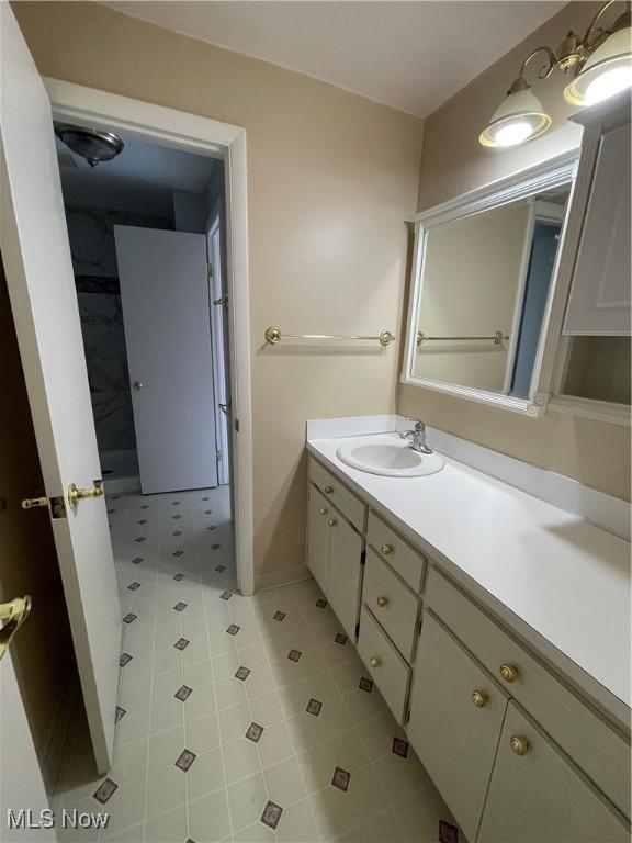 6466 Concord Rd Unit M4, Parma, OH 44134 - bathroom with vanity and baseboards