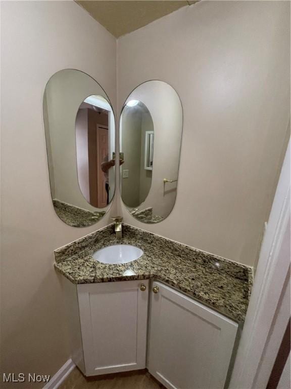 6466 Concord Rd Unit M4, Parma, OH 44134 - bathroom with vanity and baseboards