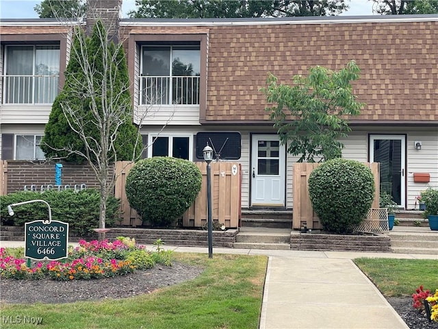 6466 Concord Rd Unit M4, Parma, OH 44134 - front of property with a shingled roof and mansard roof