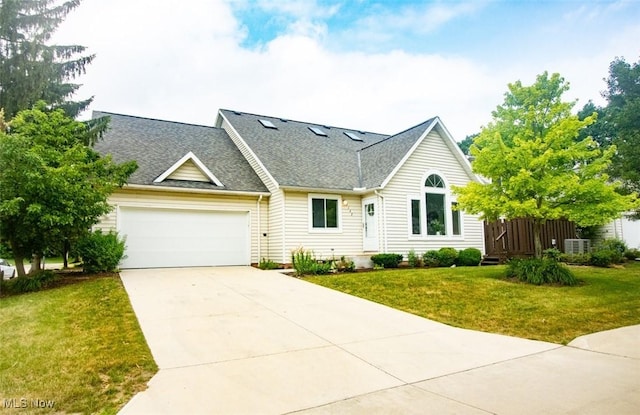 7142 N Oxshire Pl, Concord, OH 44077 - traditional-style home with a garage, a front lawn, concrete driveway, and roof with shingles