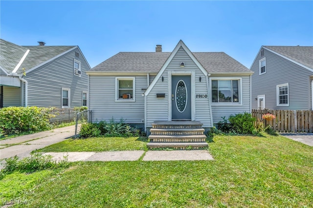 29100 Weber Ave, Wickliffe, OH 44092 - view of front of home featuring a chimney and roof with shingles