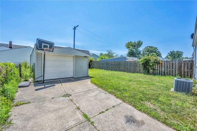 29100 Weber Ave, Wickliffe, OH 44092 - view of yard featuring an outdoor structure, concrete driveway, and a garage