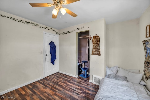 29100 Weber Ave, Wickliffe, OH 44092 - bedroom with dark wood-style flooring, ceiling fan, and a closet