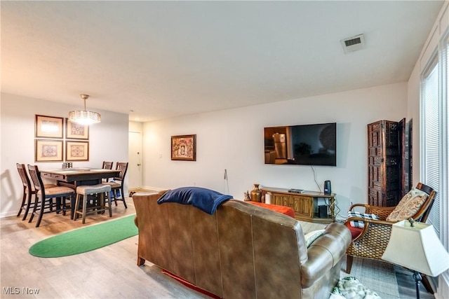 985 Canyon View Rd Unit 204C, Northfield, OH 44067 - living room with wood finished floors and baseboards