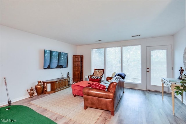 985 Canyon View Rd Unit 204C, Northfield, OH 44067 - living area with light wood finished floors and healthy amount of natural light