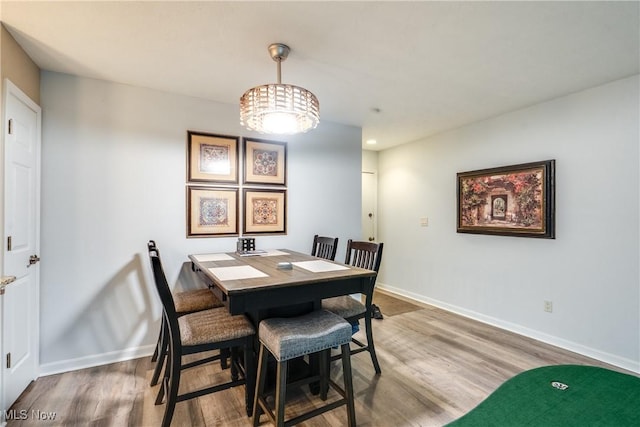 985 Canyon View Rd Unit 204C, Northfield, OH 44067 - dining room with wood finished floors and baseboards