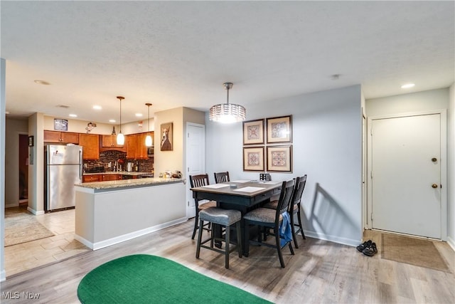 985 Canyon View Rd Unit 204C, Northfield, OH 44067 - dining room with light wood-style flooring and recessed lighting